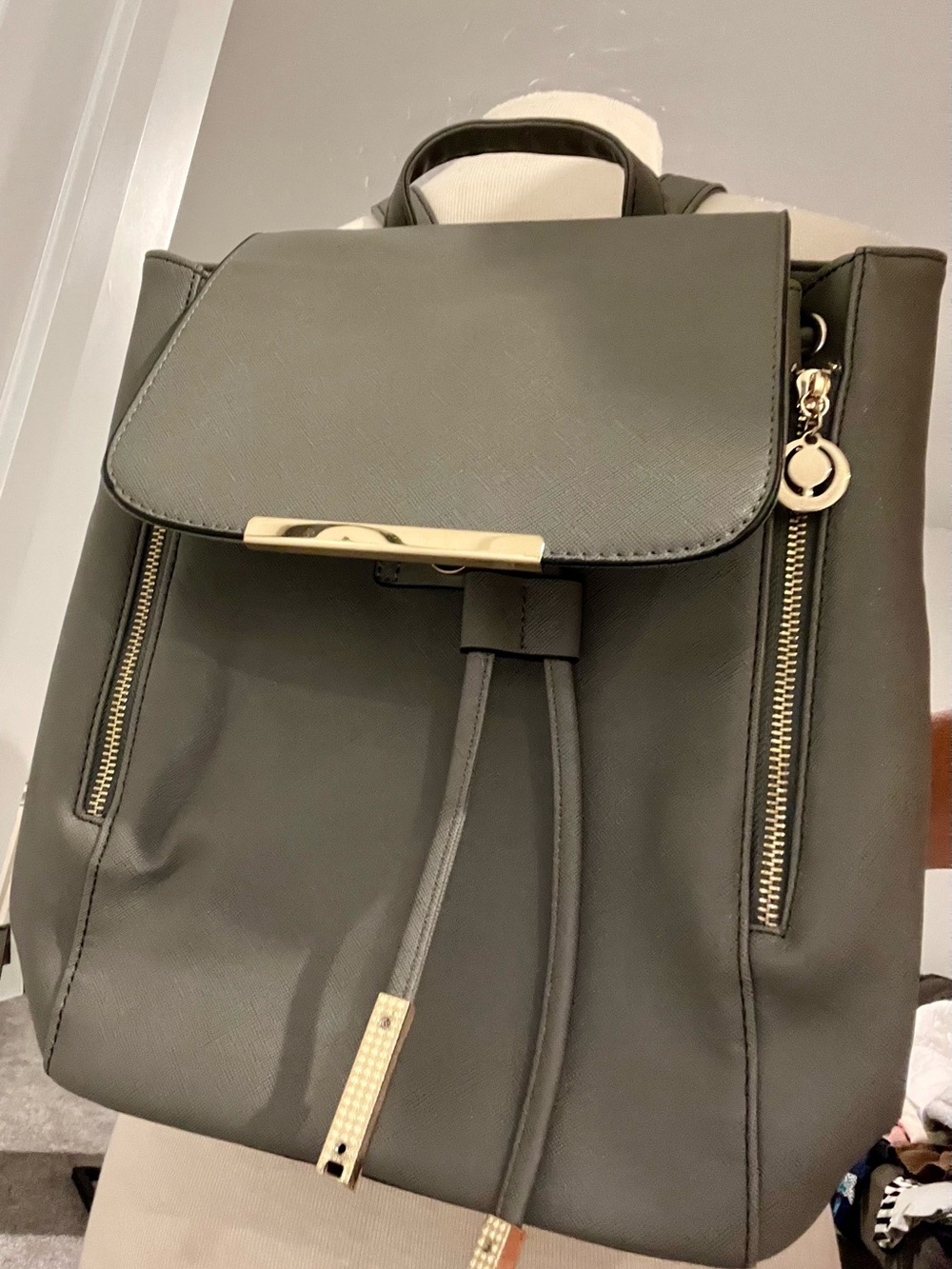 Sleek Backpack Purse with Gold Hardware